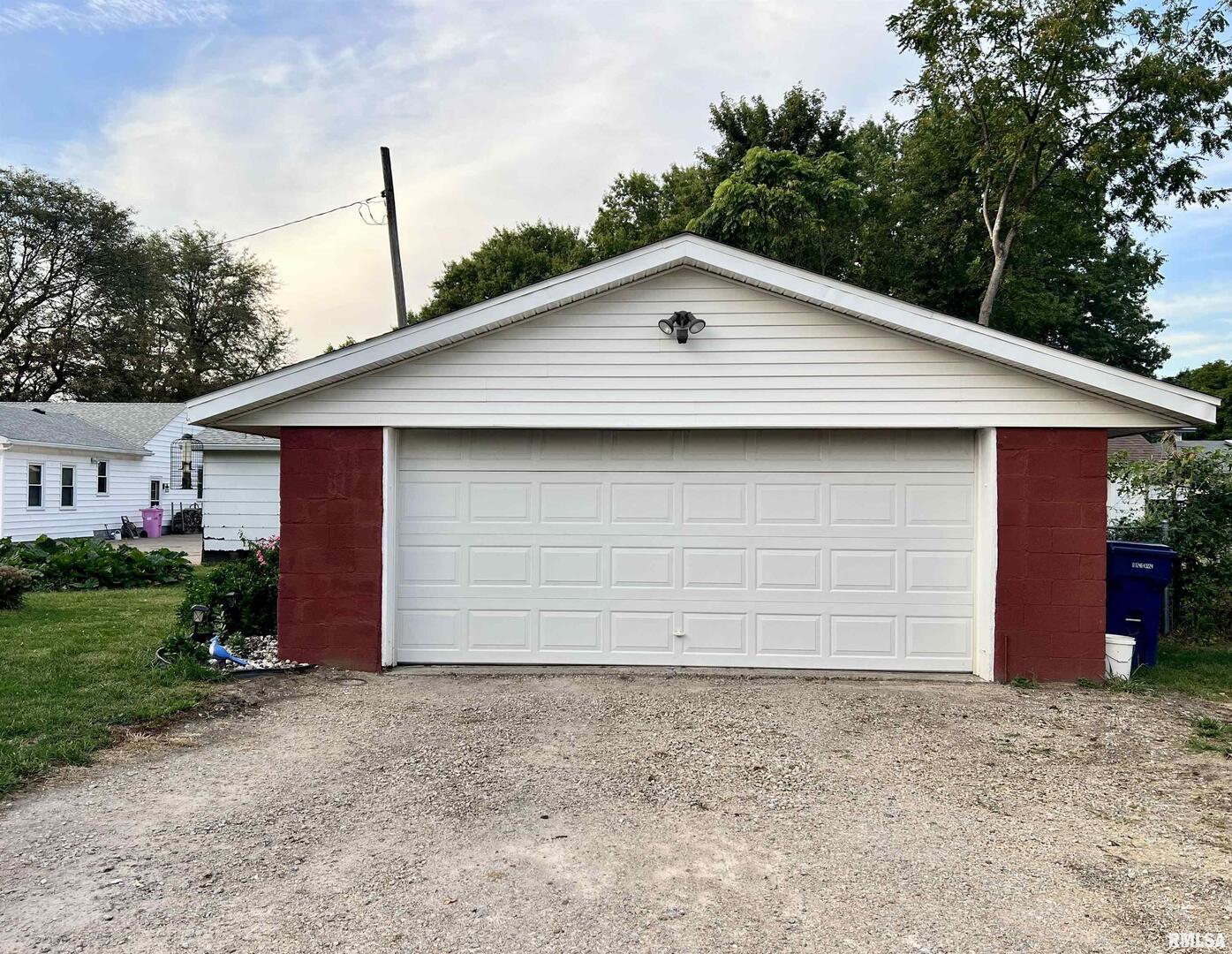 209 Northwest 6th Street Aledo, IL 61231 - Photo 27 of 28 a front view of a house with a yard