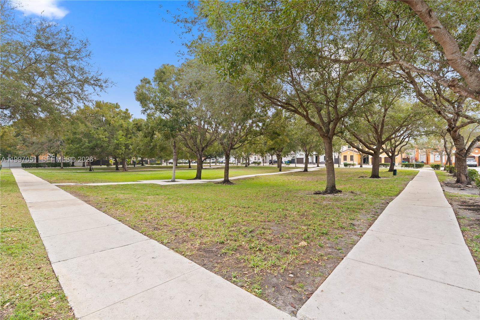 8968 Northwest 180th Terrace Hialeah, FL 33018 - Photo 15 of 17 Park in front of property