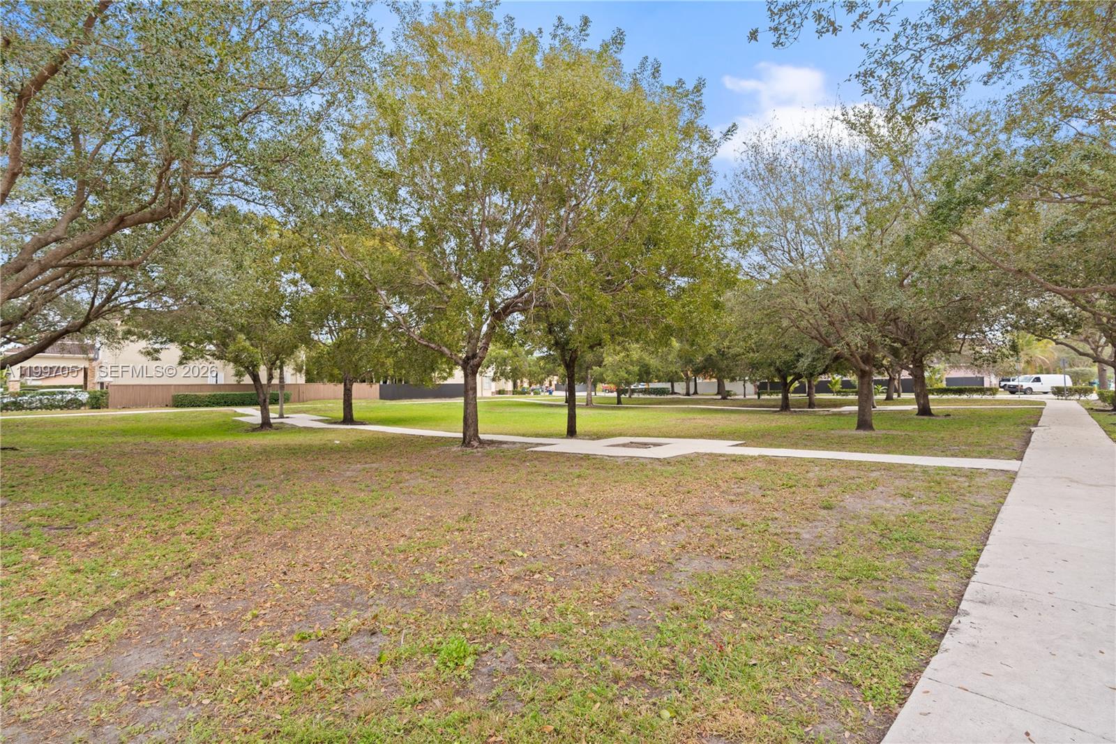 8968 Northwest 180th Terrace Hialeah, FL 33018 - Photo 16 of 17 Park in front of property