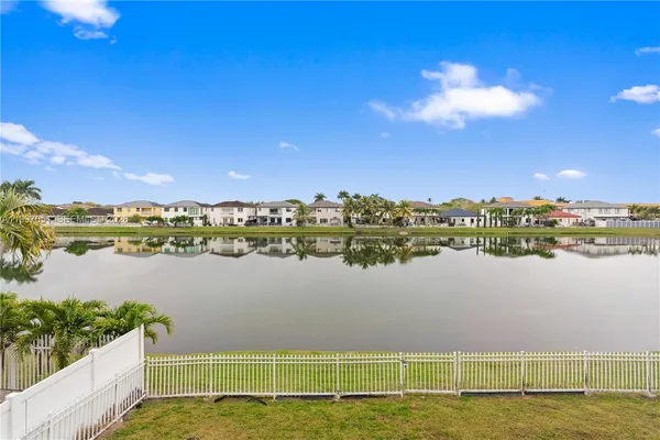 a view of a lake with a city