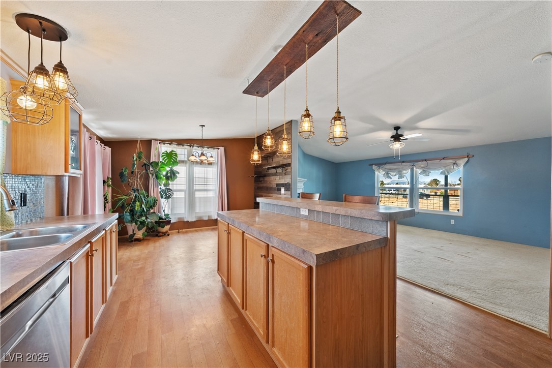 1391 East Casey Road Pahrump, NV 89048 - Photo 11 of 40 Kitchen with dishwasher, a sink, healthy amount of