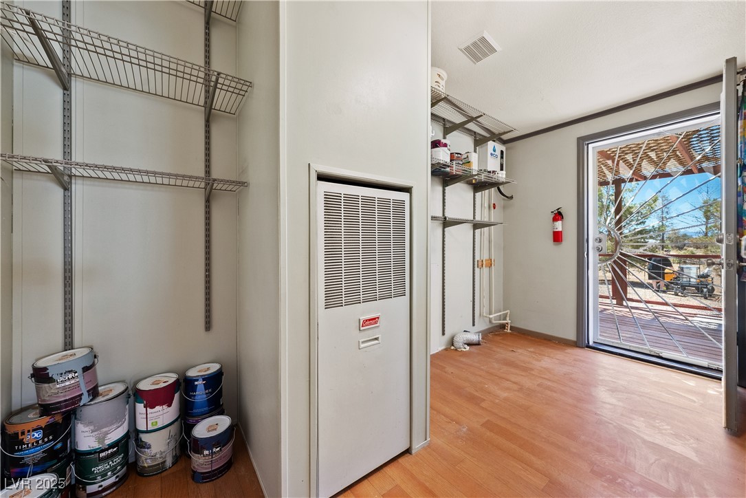 1391 East Casey Road Pahrump, NV 89048 - Photo 28 of 40 Utility room featuring a heating unit