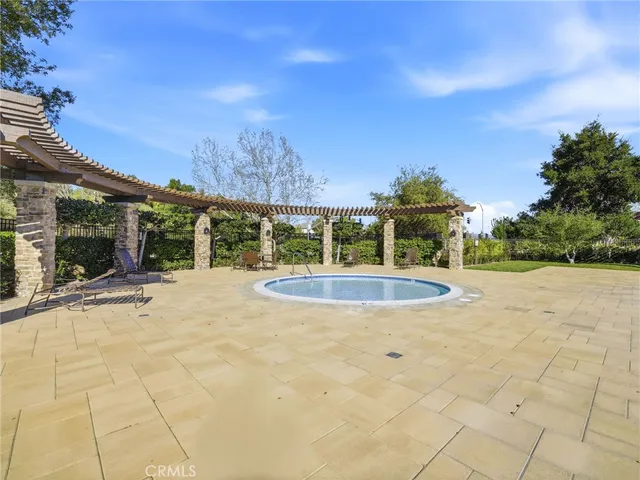 a view of a playground with basketball court