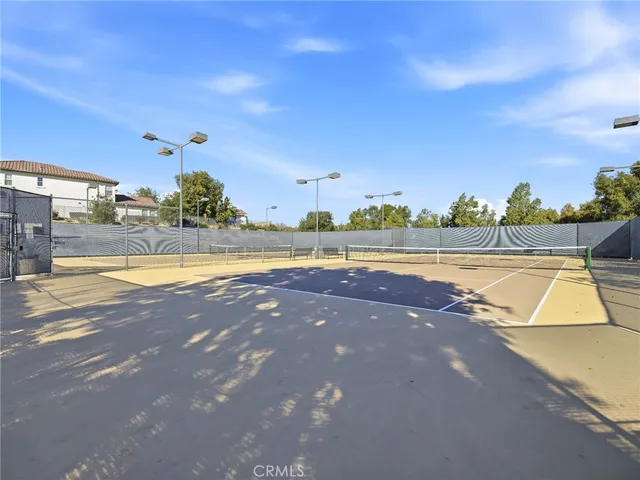 a view of a swimming pool and an outdoor space