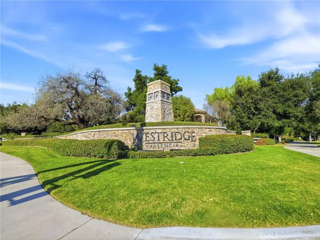 a view of a park with welcome board