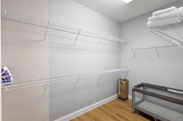 a view of a room with racks on the wall