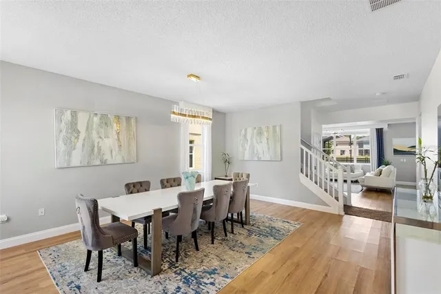 a view of a dining room with furniture