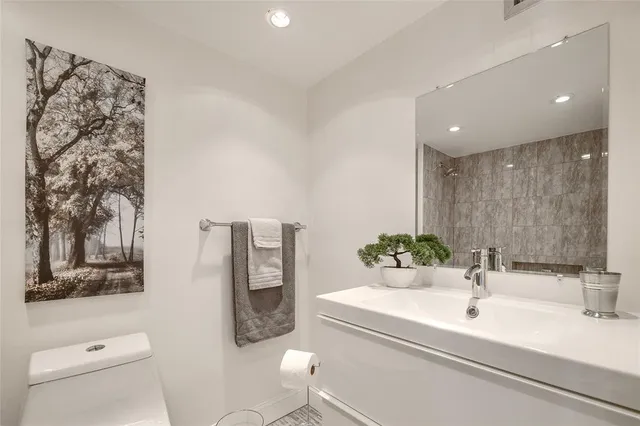 a bathroom with a bathtub and shower