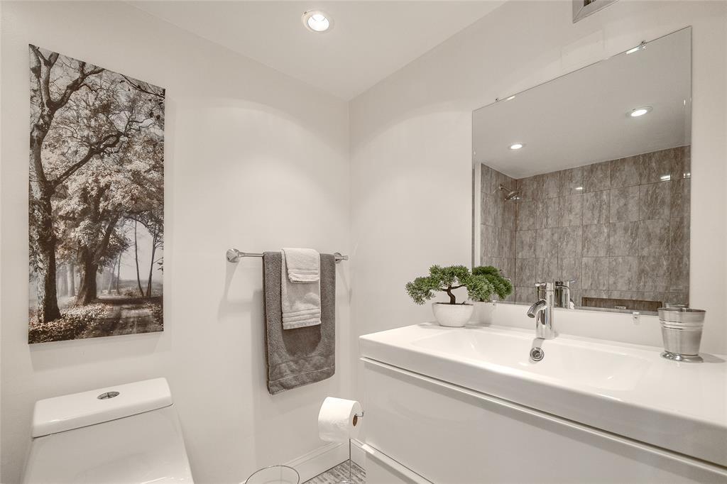 6100 Northwest 44th Street, Unit 307 Lauderhill, FL 33319 - Photo 17 of 54 a bathroom with a sink toilet and shower