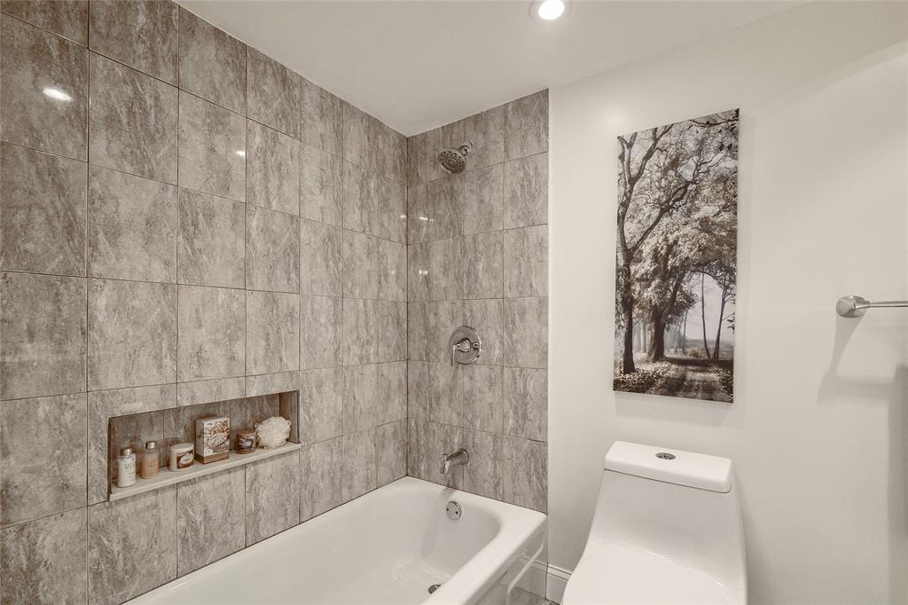 6100 Northwest 44th Street, Unit 307 Lauderhill, FL 33319 - Photo 18 of 54 a bathroom with a bathtub and shower
