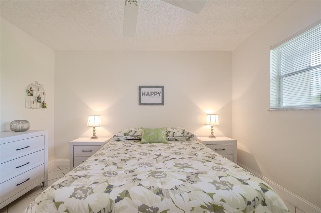 6100 Northwest 44th Street, Unit 307 Lauderhill, FL 33319 - Photo 22 of 54 a bedroom with a bed and a closet