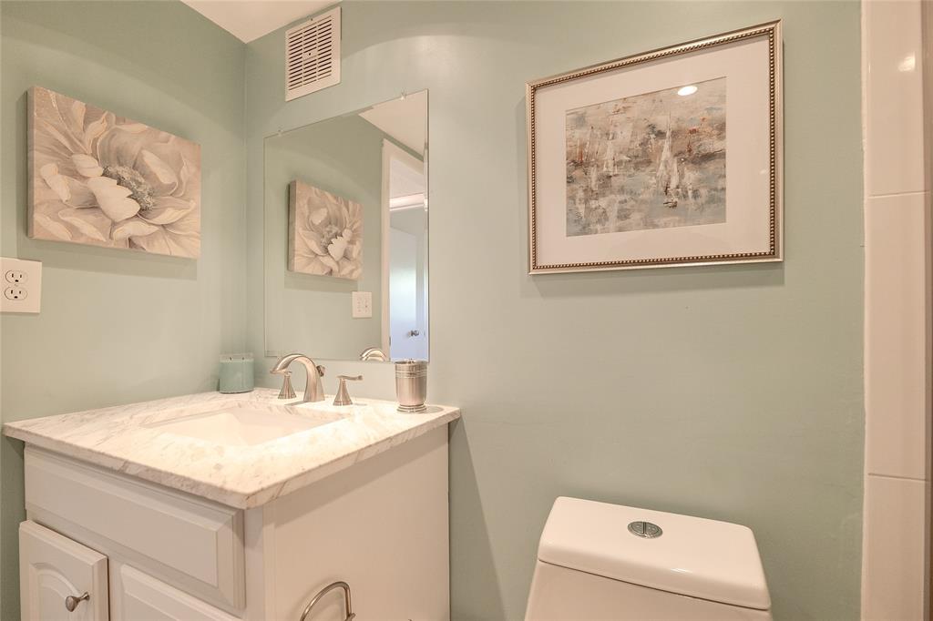 6100 Northwest 44th Street, Unit 307 Lauderhill, FL 33319 - Photo 27 of 54 a bathroom with a sink and a mirror