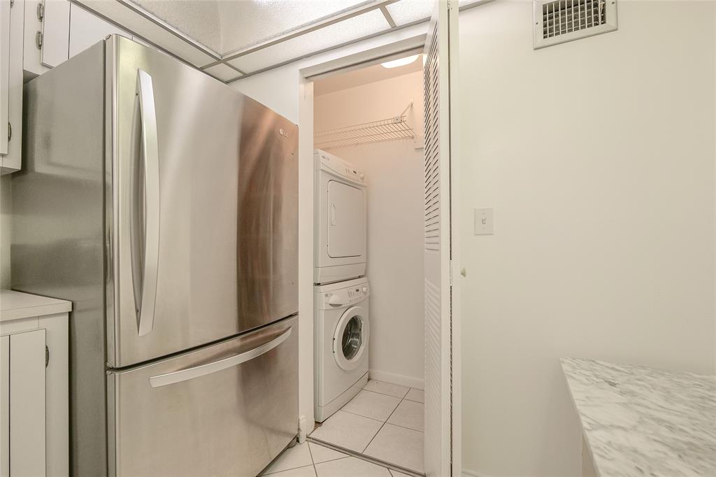 6100 Northwest 44th Street, Unit 307 Lauderhill, FL 33319 - Photo 32 of 54 a bathroom with a shower and a mirror