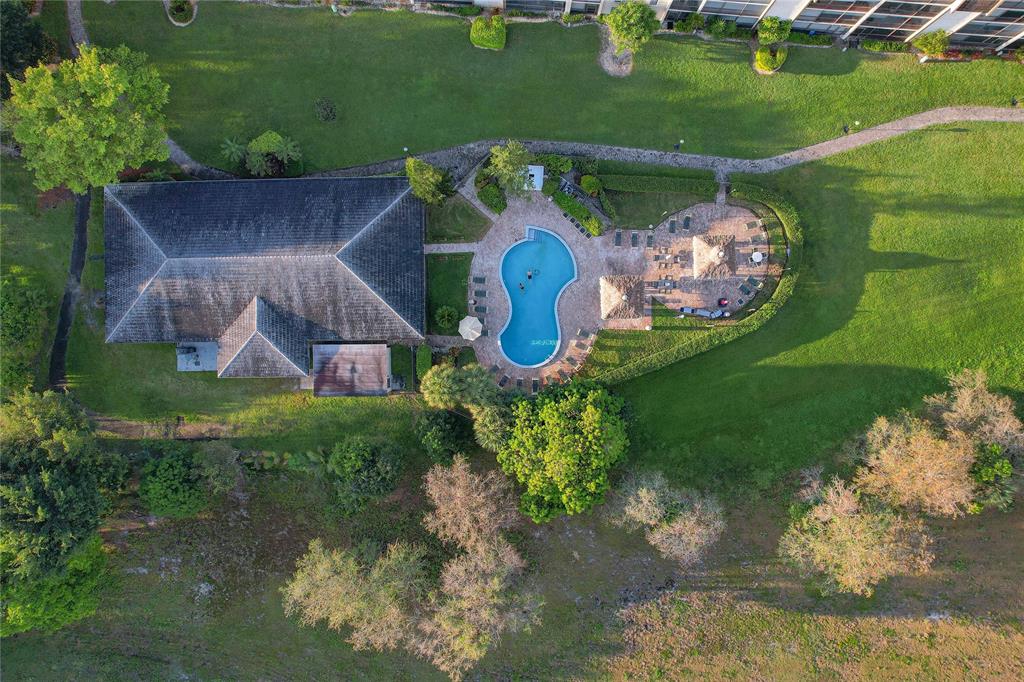 6100 Northwest 44th Street, Unit 307 Lauderhill, FL 33319 - Photo 52 of 54 an aerial view of a house with a yard basket ball court and outdoor seating