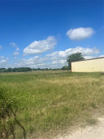 a view of an ocean from a yard