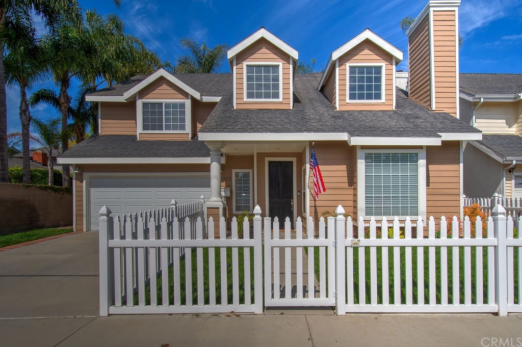 Welcoming home with classic picket fence