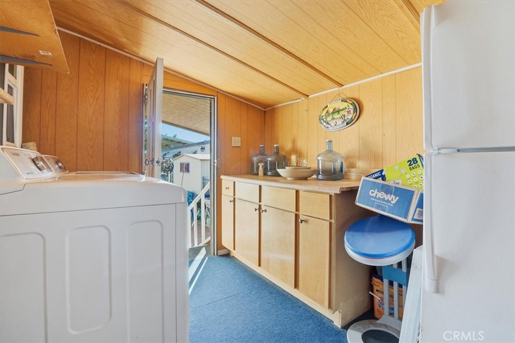 23456 Ottawa Road, Unit 92 Apple Valley, CA 92308 - Photo 27 of 38 Large Laundry Room/Pantry/Storage and Xtra Refrigerator area.