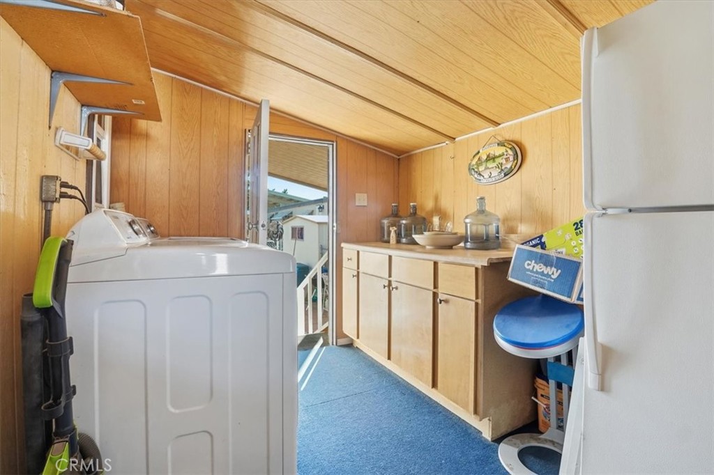 23456 Ottawa Road, Unit 92 Apple Valley, CA 92308 - Photo 28 of 38 Large Laundry Room/Pantry/Storage and Xtra Refrigerator area.