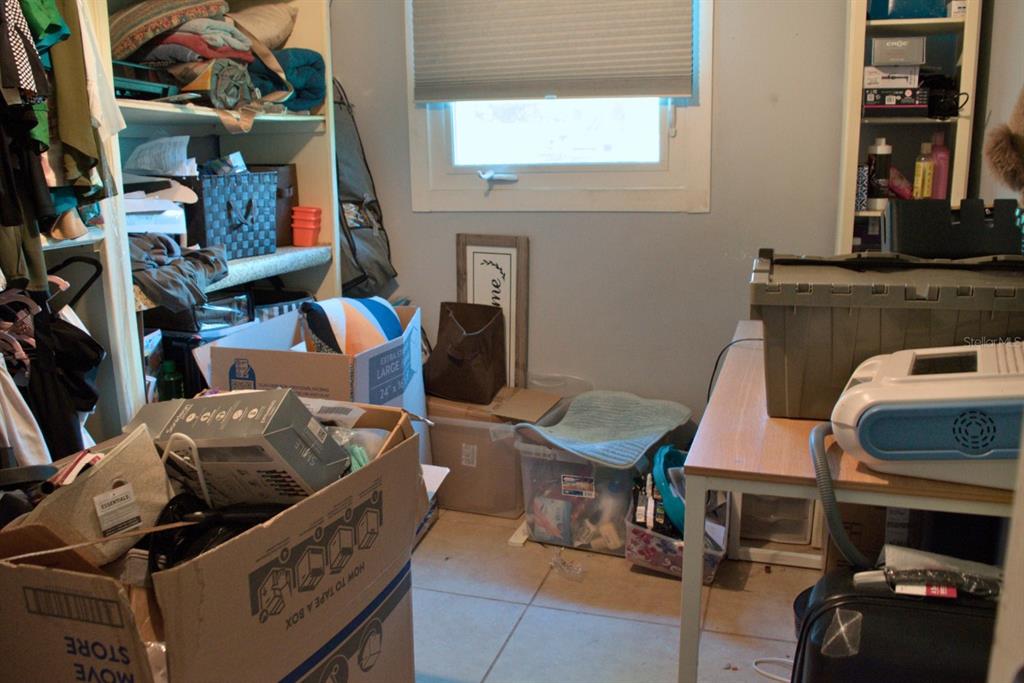 10607 Fernando Street Orlando, FL 32825 - Photo 14 of 19 a living room with furniture and a window