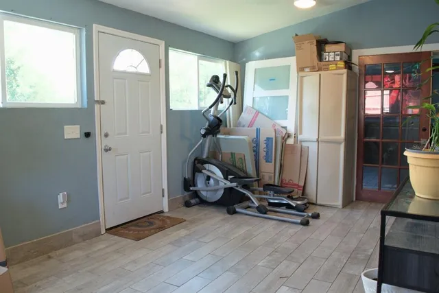 a view of a room with gym equipment