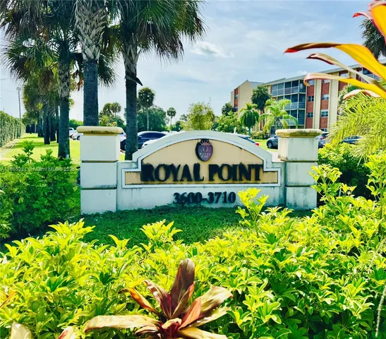 a view of a garden with a fountain
