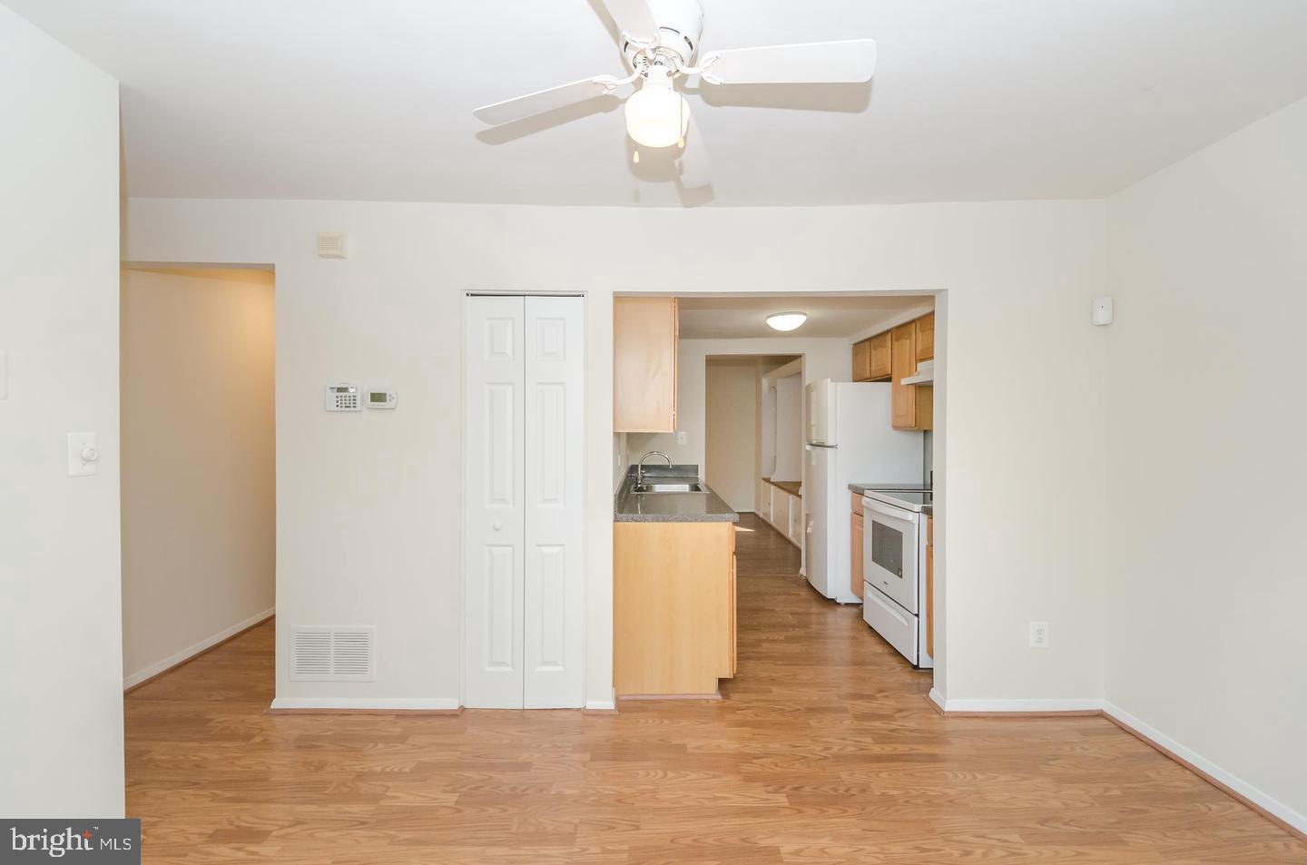 1822 Foxdale Court Crofton, MD 21114 - Photo 11 of 38 a view of a hallway with wooden floor
