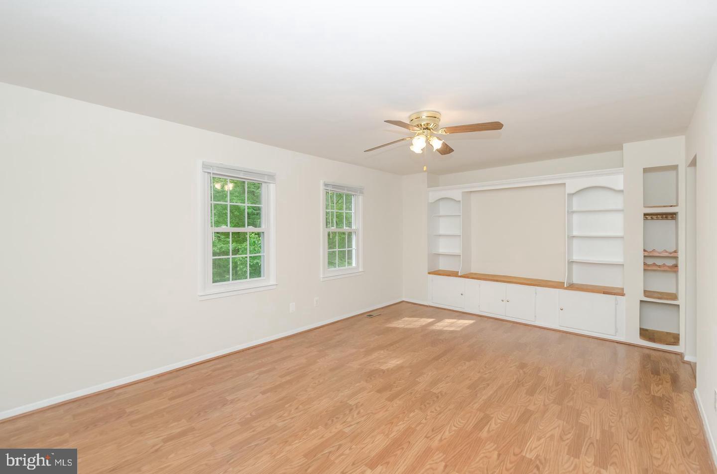 1822 Foxdale Court Crofton, MD 21114 - Photo 16 of 38 an empty room with closet and windows