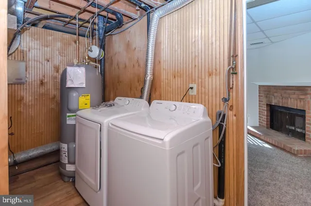 a utility room with dryer and washer