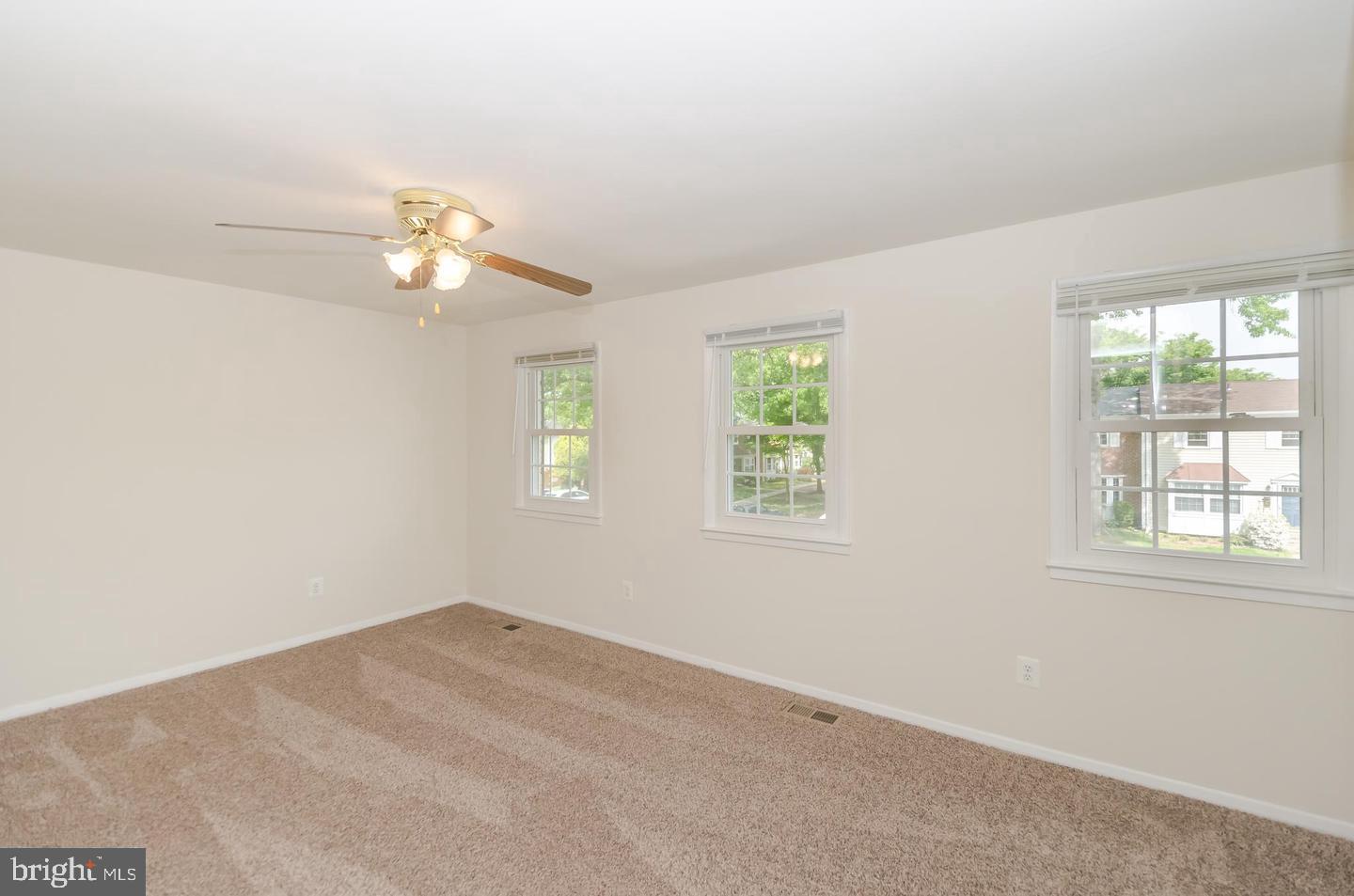 1822 Foxdale Court Crofton, MD 21114 - Photo 28 of 38 an empty room with windows and fan