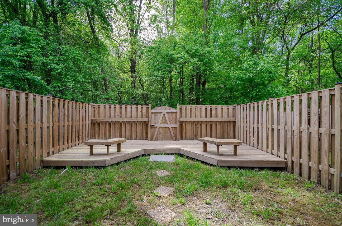 1822 Foxdale Court Crofton, MD 21114 - Photo 36 of 38 a view of a chair and table in backyard