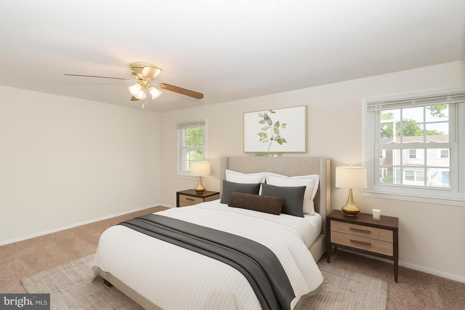 1822 Foxdale Court Crofton, MD 21114 - Photo 4 of 38 a bedroom with a bed and a chandelier