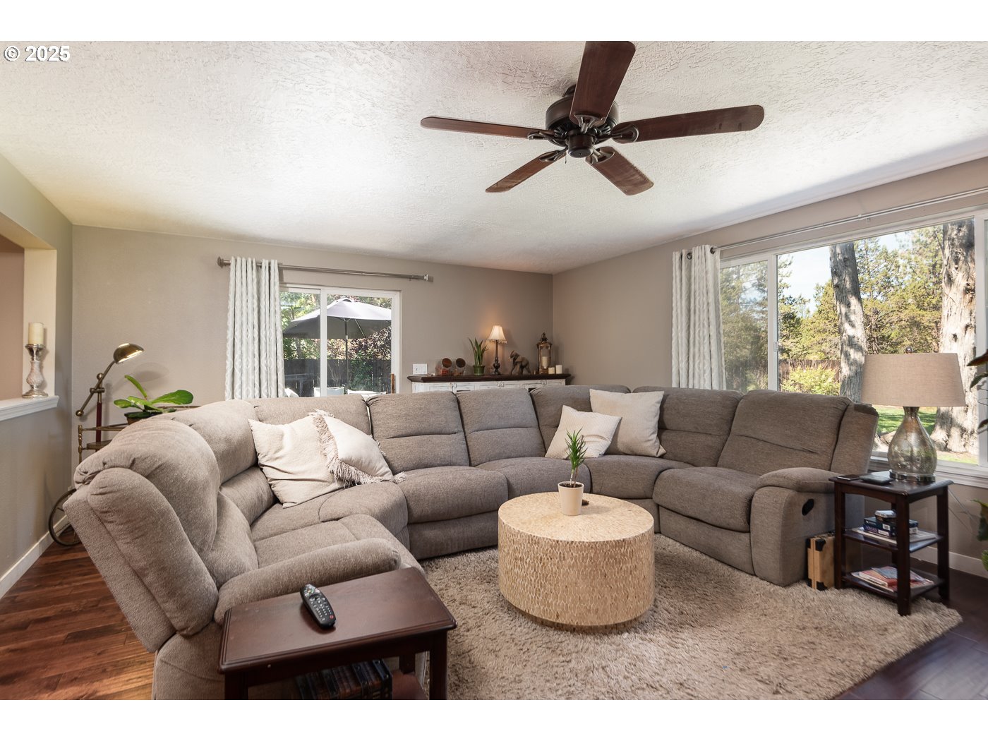 60811 Windsor Drive Bend, OR 97702 - Photo 14 of 27 a living room with furniture and a large window