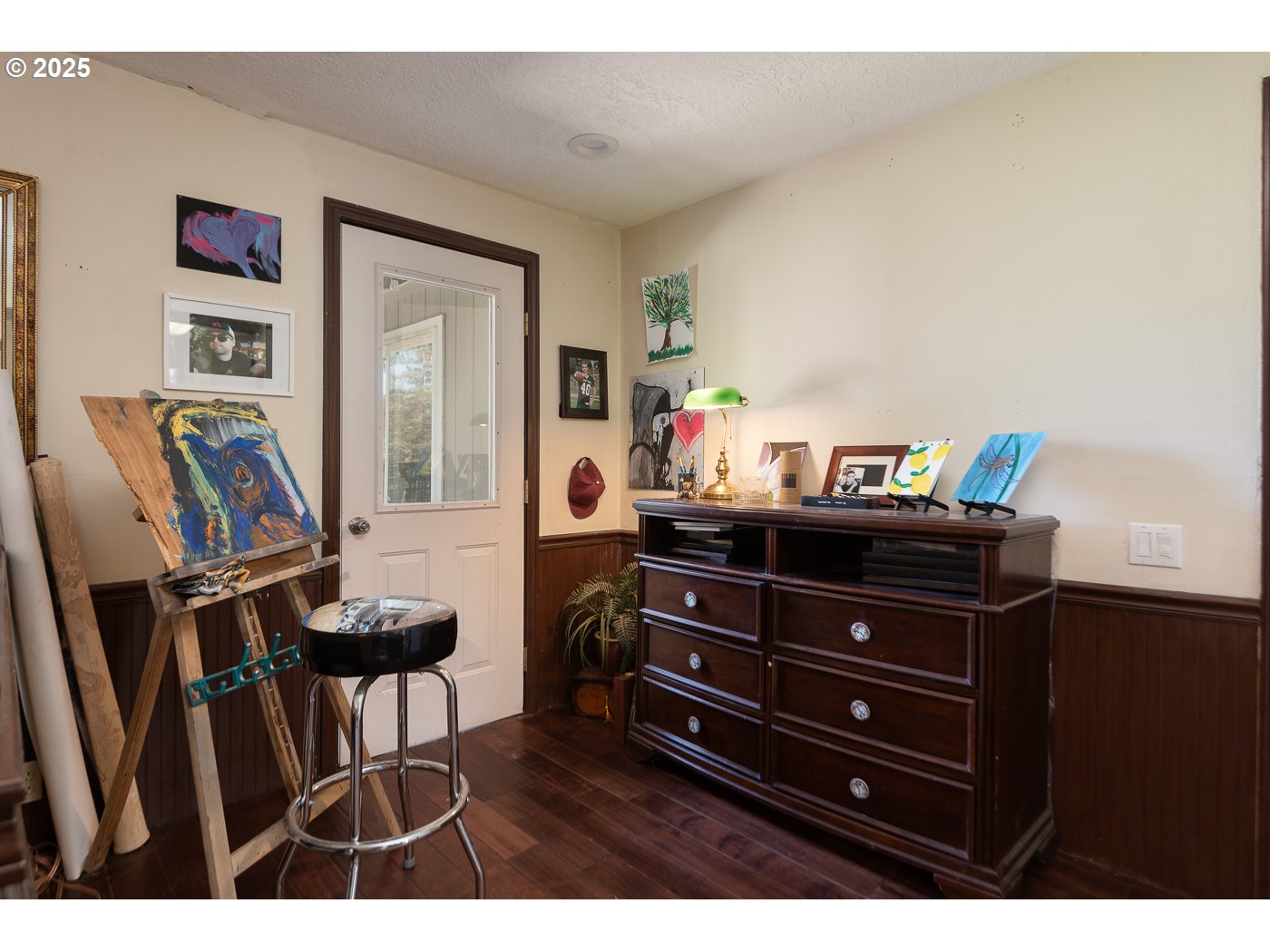 60811 Windsor Drive Bend, OR 97702 - Photo 27 of 27 a room with a dresser and a bookshelf
