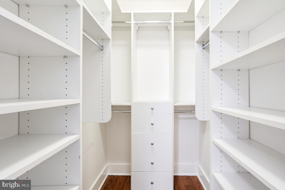 2331 15th Street Northwest, Unit 108N Washington, DC 20009 - Photo 13 of 25 a view of cabinets and utility room with empty racks