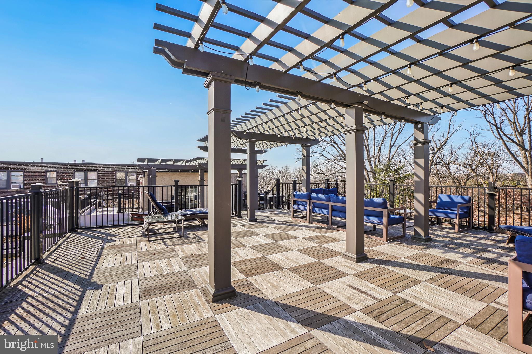 2331 15th Street Northwest, Unit 108N Washington, DC 20009 - Photo 16 of 25 a view of a patio with a table and chairs