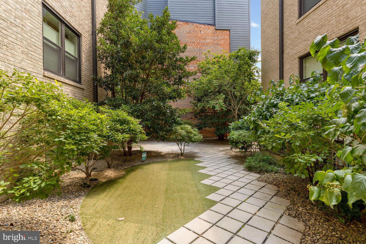 2331 15th Street Northwest, Unit 108N Washington, DC 20009 - Photo 21 of 25 a view of a backyard with plants