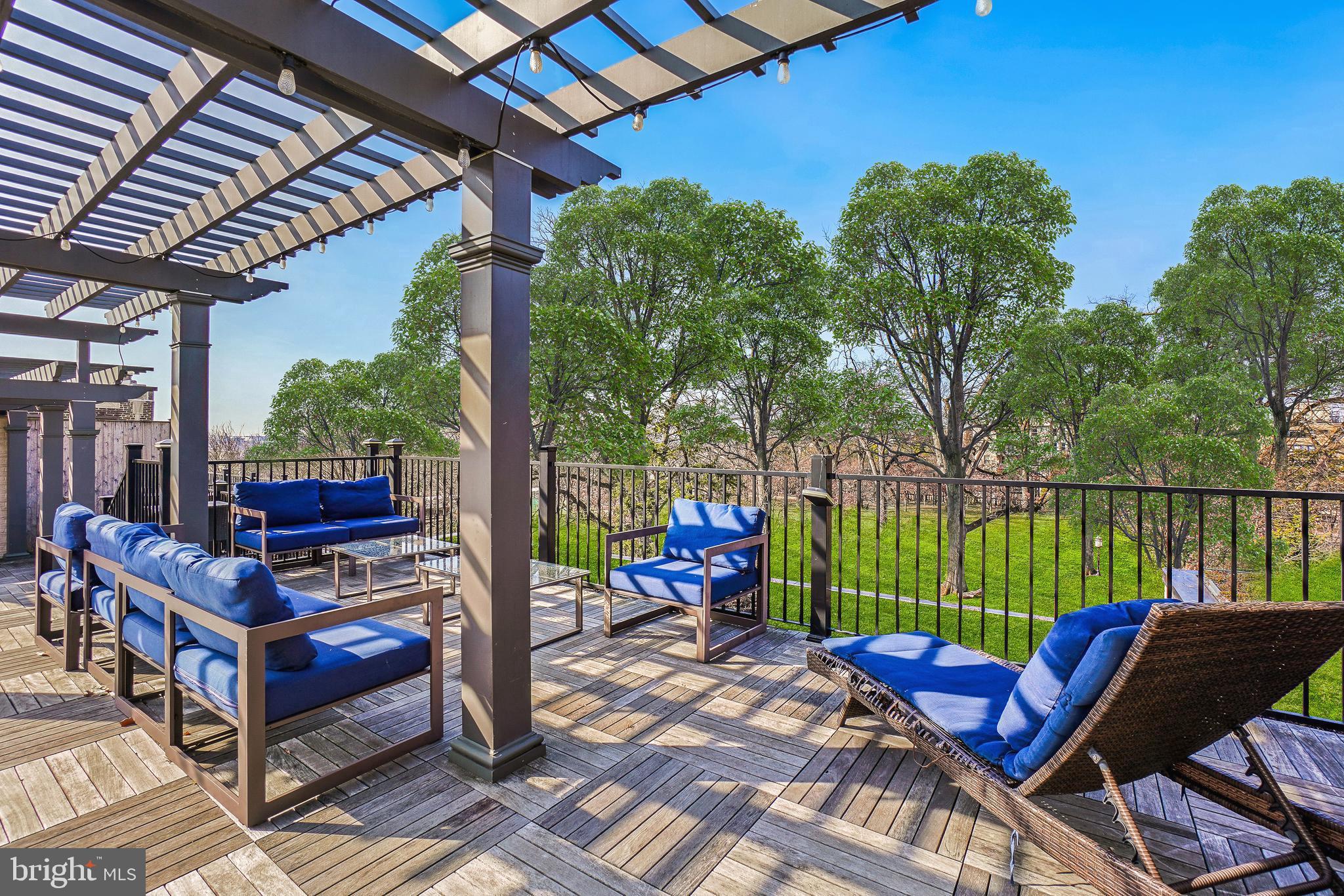 2331 15th Street Northwest, Unit 108N Washington, DC 20009 - Photo 4 of 25 a view of a chairs and table in the patio