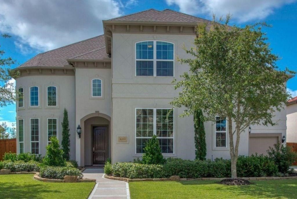 26519 Ashley Ridge Lane Katy, TX 77494 - Photo 24 of 28 a front view of a house with a yard