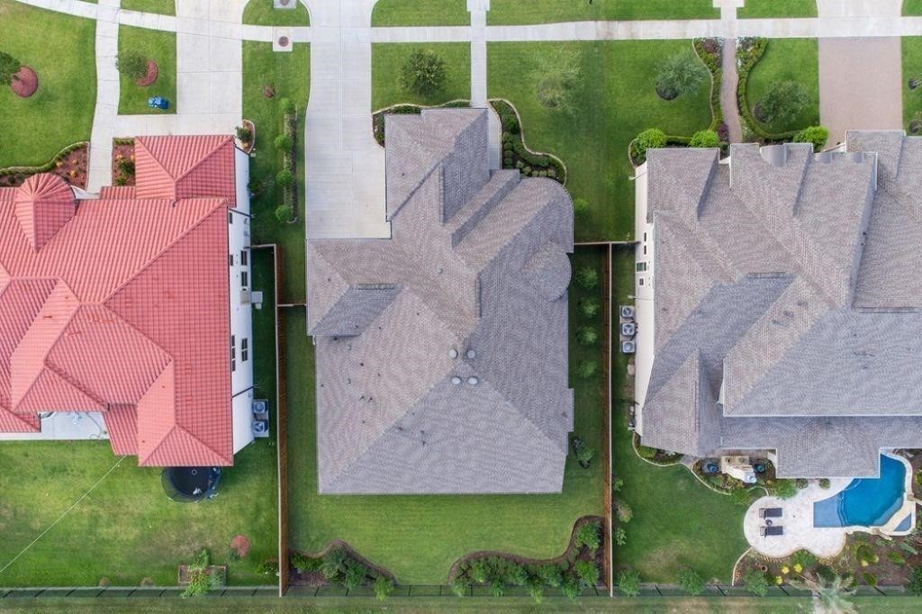 26519 Ashley Ridge Lane Katy, TX 77494 - Photo 25 of 28 an aerial view of a house with outdoor space and a garden