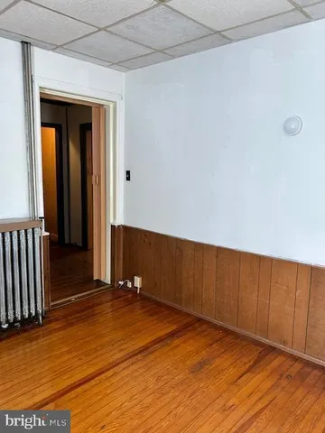 a view of a large body of water with a building in the background