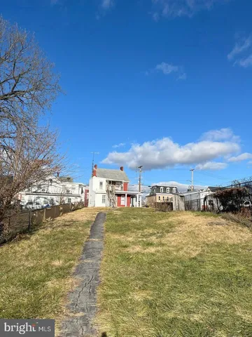 a front view of a building with glass windows