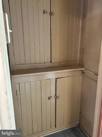 a bathroom with a sink a toilet and bathtub