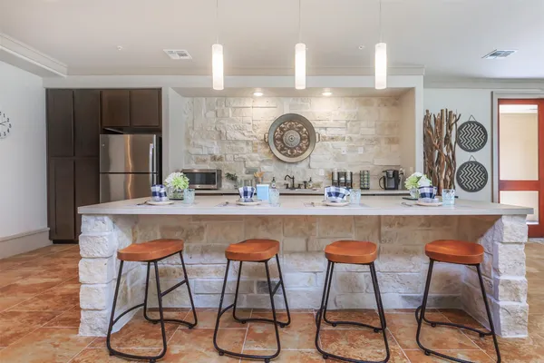 a living room with furniture fireplace and a flat screen tv