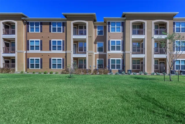 a large building with a garden