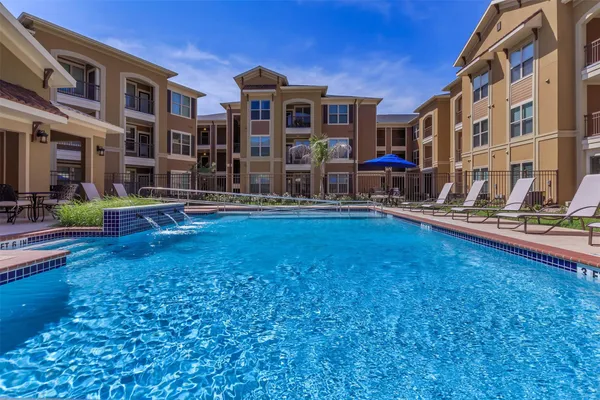 a front view of building with outdoor seating