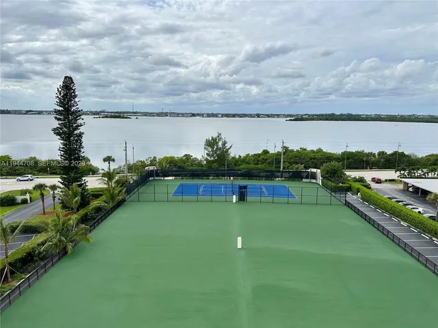 a view of a lake with a big yard