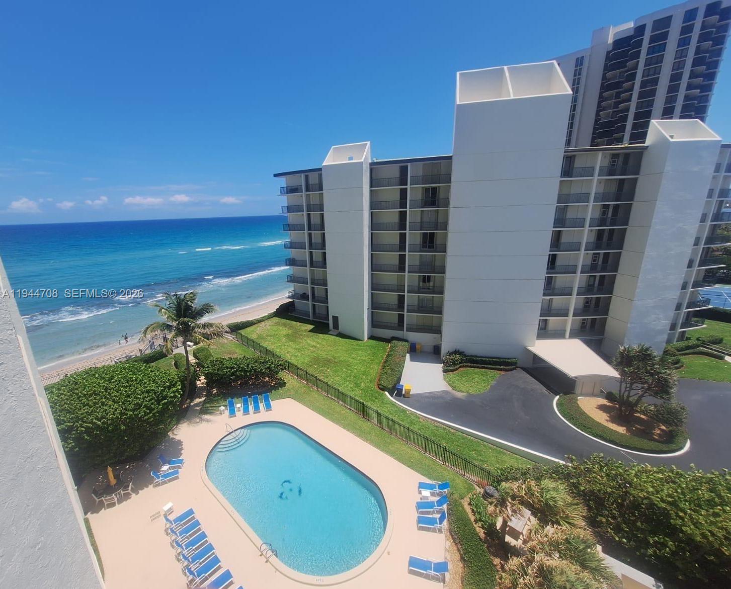 5420 North Ocean Drive, Unit 706 Singer Island, FL 33404 - Photo 2 of 41 a view of a swimming pool with outdoor space