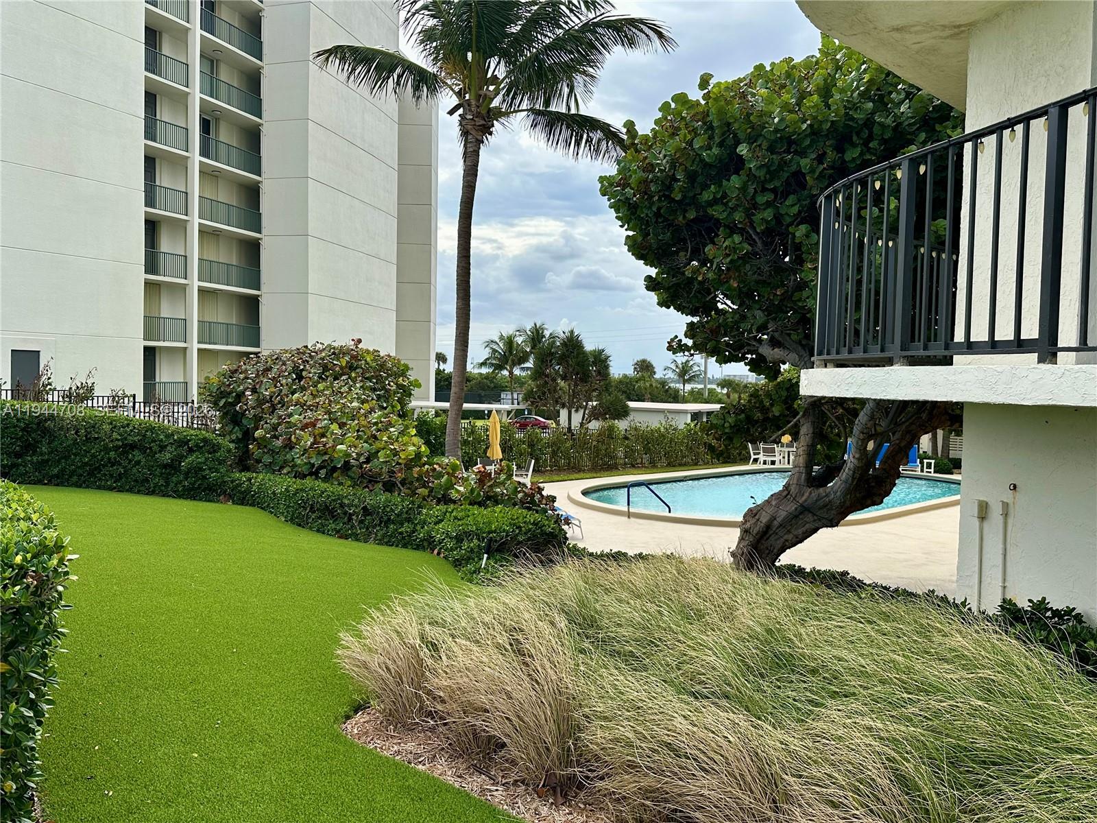 5420 North Ocean Drive, Unit 706 Singer Island, FL 33404 - Photo 32 of 41 a view of a garden with plants