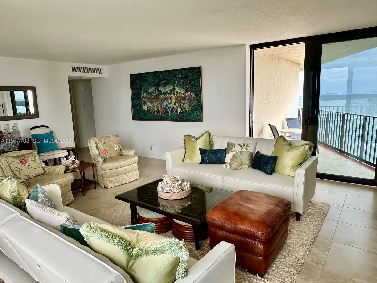 5420 North Ocean Drive, Unit 706 Singer Island, FL 33404 - Photo 6 of 41 a living room with furniture and a window