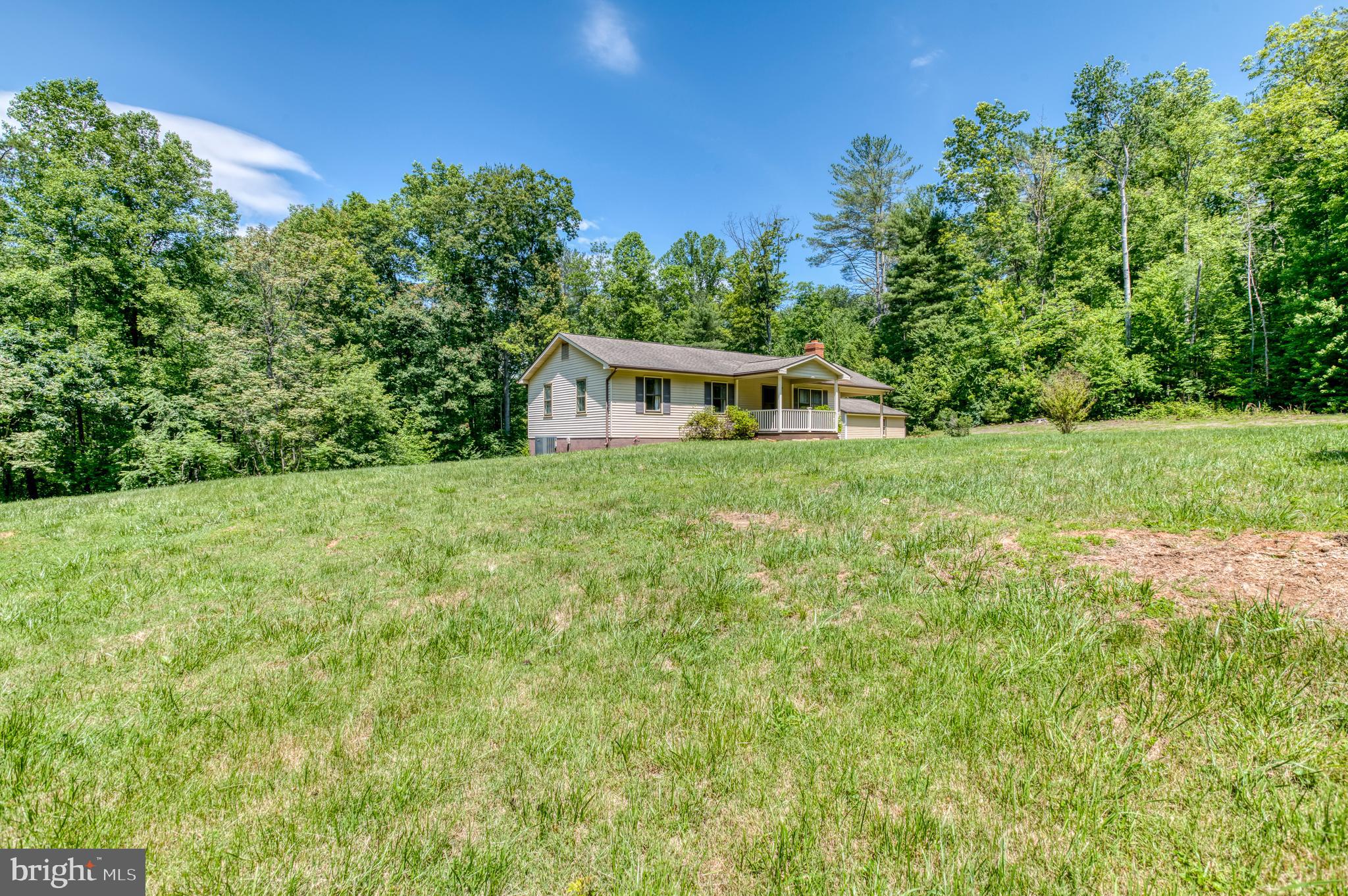 803 Weaver Hollow Road Banco, VA 22711 - Photo 32 of 67 a house view with a garden space